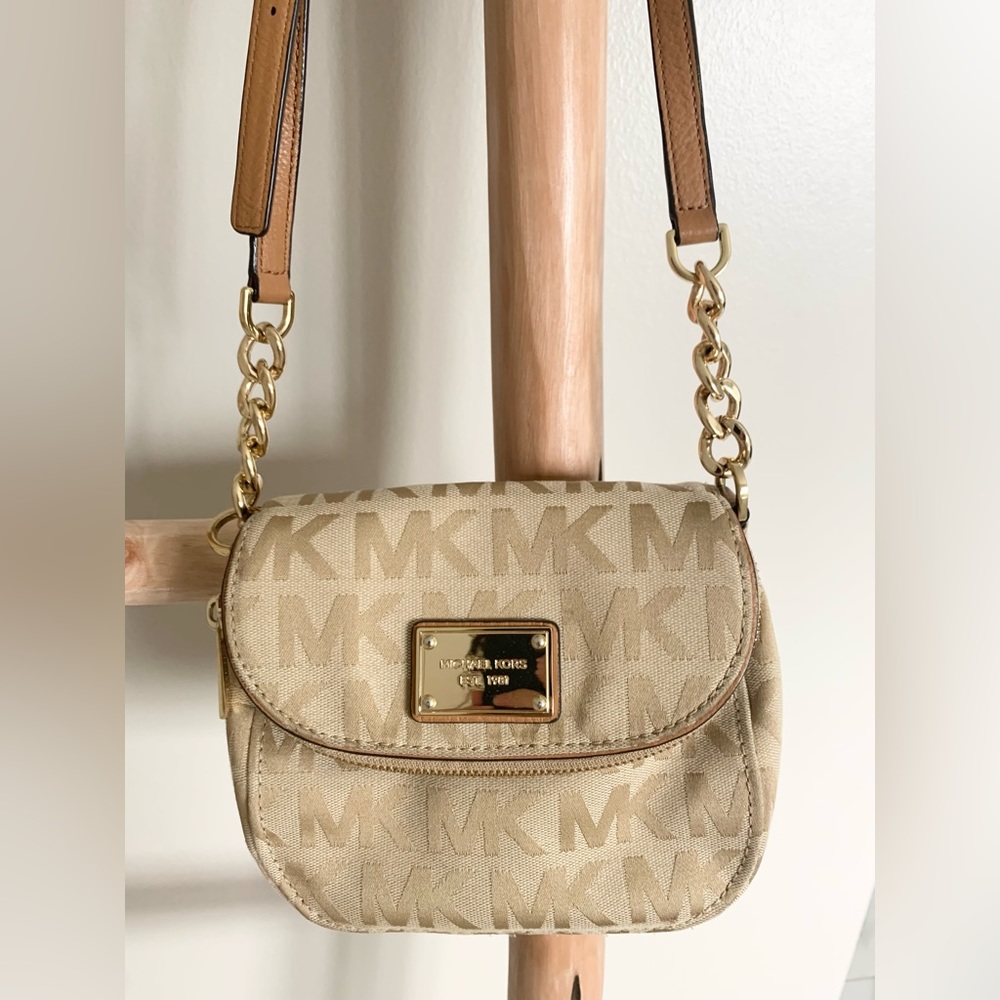 Michael Kors beige, gold cross body bag.